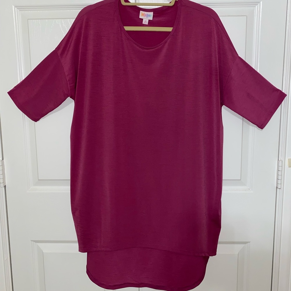 LuLaRoe Irma top
size Medium 
Like new 
Pet free and smoke free home